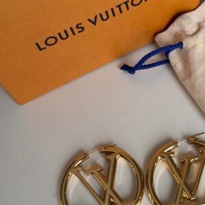 LV Gold Logo Hoop Earrings; heavy look and lightly used